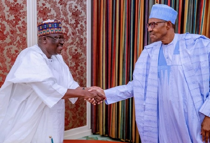 President Muhammadu Buhari in Handshake with the Senate President, Ahmad Lawan