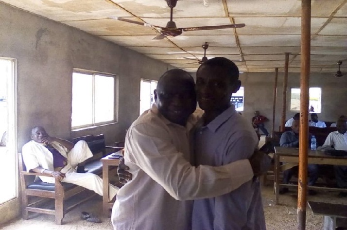 Mr Dele Ayeni, the passenger who forgot the money in an airport cab and Mr Adeniyi Olayinka , the airport cab driver who returned the N.8million forgotten in his cab by the passenger, in a warm embrace on Wednesday July 31, 2019 . (NAN)